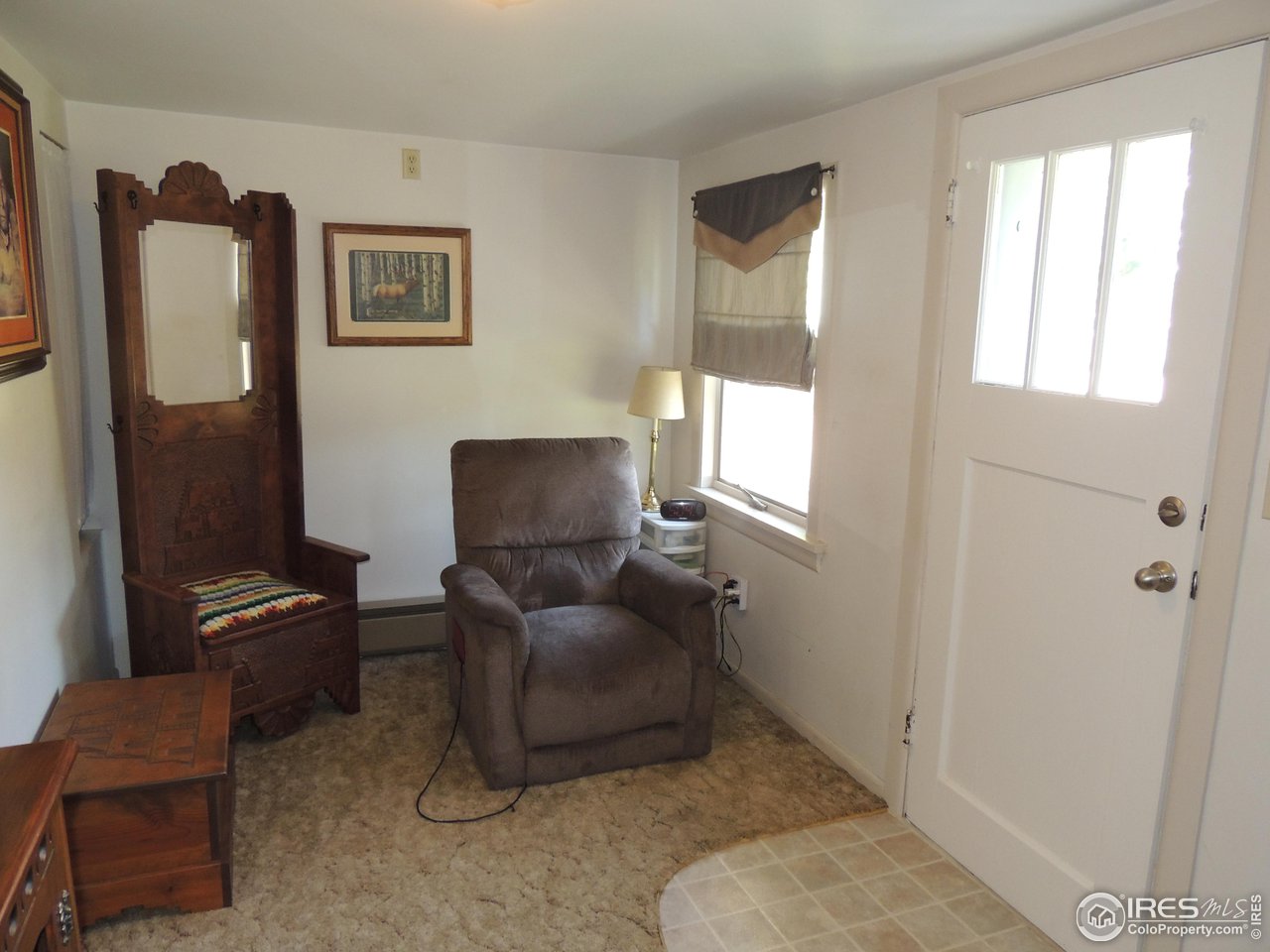 3920 Northeast County Line Road Erie, CO 80516 - Photo 14 of 37 Sitting porch