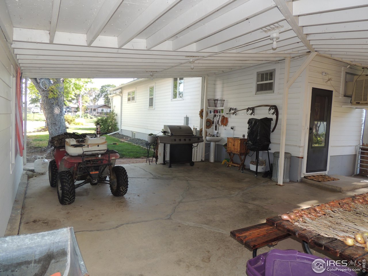 3920 Northeast County Line Road Erie, CO 80516 - Photo 33 of 37 Huge covered patio