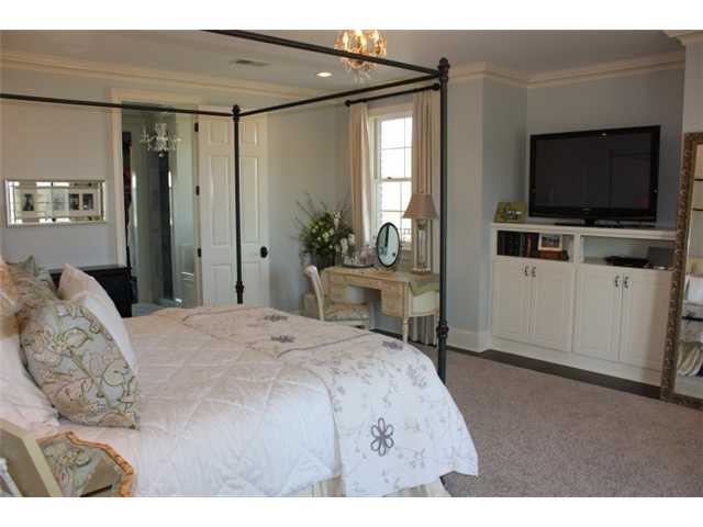 288 Irvin Road Stantonville, TN 38379 - Photo 16 of 25 1 of 3 Upstairs Masters Each with their Own Private Bath with Marble Finishes and Custom Dressing Room Style Closets - Additional 2nd Level Laundry