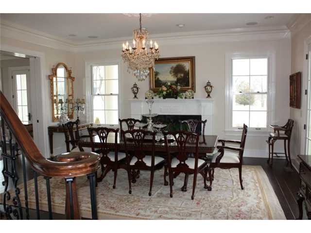 288 Irvin Road Stantonville, TN 38379 - Photo 9 of 25 Dining Room/Crystal Antiqued Reproduction Chandelier/Marble Surround Gas Fireplace/10ft ceiling with 14in crown moldings/French Doors