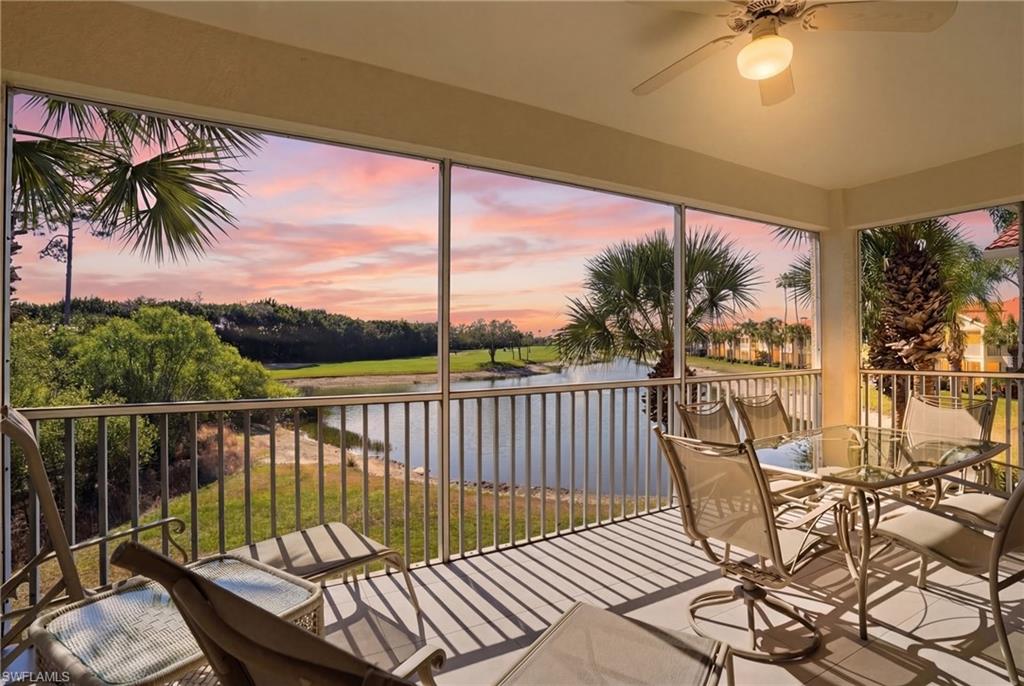 4620 Winged Foot Court, Unit 201 Naples, FL 34112 - Photo 1 of 44 Sunroom featuring a water view