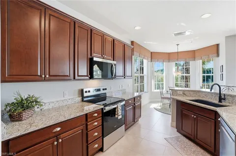$595,900 | 4620 Winged Foot Court, Unit 201, Naples, FL 34112