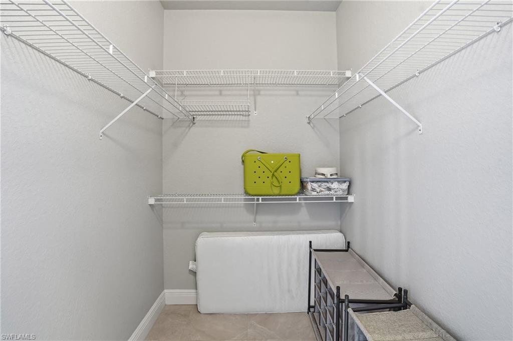 4620 Winged Foot Court, Unit 201 Naples, FL 34112 - Photo 26 of 44 View of walk in closet