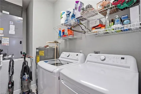 $595,900 | 4620 Winged Foot Court, Unit 201, Naples, FL 34112