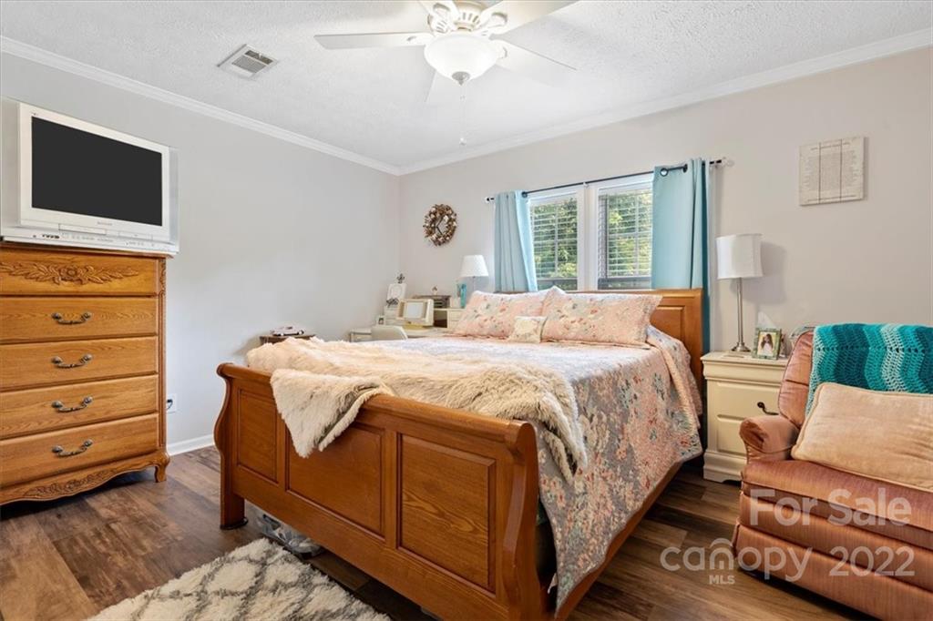1158 Turkey Creek Ridge Road York, SC 29745 - Photo 8 of 13 a bedroom with a bed and a flat screen tv