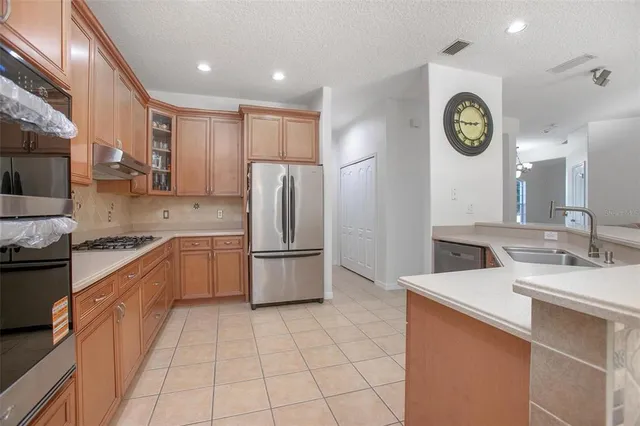 a room with furniture and wooden floor