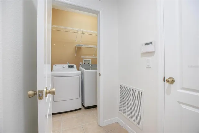a bathroom with a sink and mirror with toilet