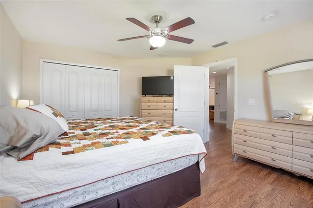 a view of a balcony with floor to ceiling windows