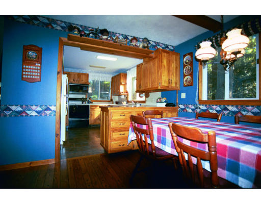 9 Don Emerson Road Chesterfield, MA 01012 - Photo 5 of 11 a kitchen with stainless steel appliances granite countertop a sink dishwasher and a dining table with garden view