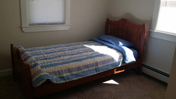 50 Cohasset Road Wareham, MA 02532 - Photo 7 of 11 a bed sitting in a bedroom next to a window