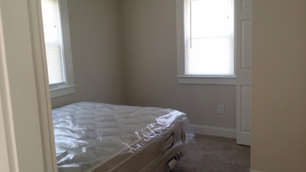 50 Cohasset Road Wareham, MA 02532 - Photo 8 of 11 a bedroom with a bed and a window