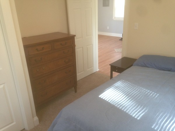 50 Cohasset Road Wareham, MA 02532 - Photo 10 of 11 a bedroom with a bed and a cabinets