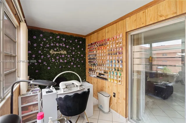 a view of a balcony with table and chairs