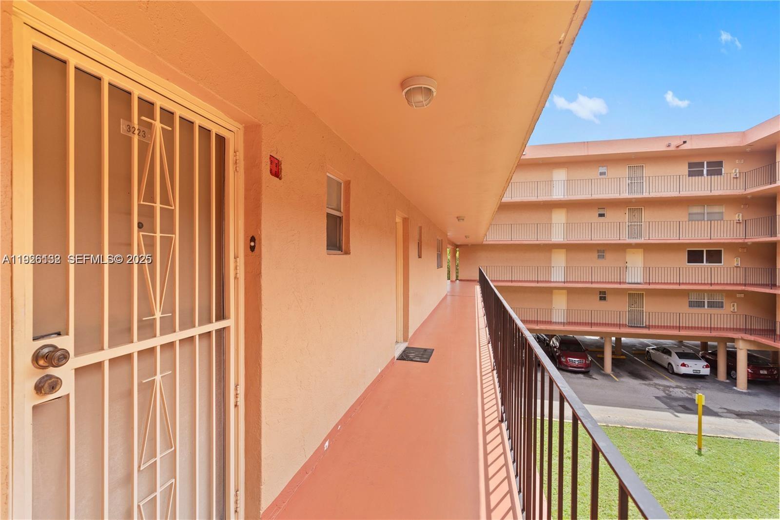 1810 West 56th Street, Unit 3223 Hialeah, FL 33012 - Photo 17 of 19 a view of a balcony