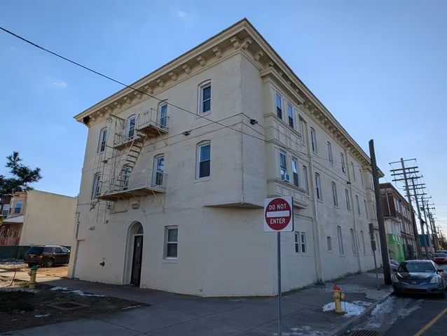 a view of a street with parking