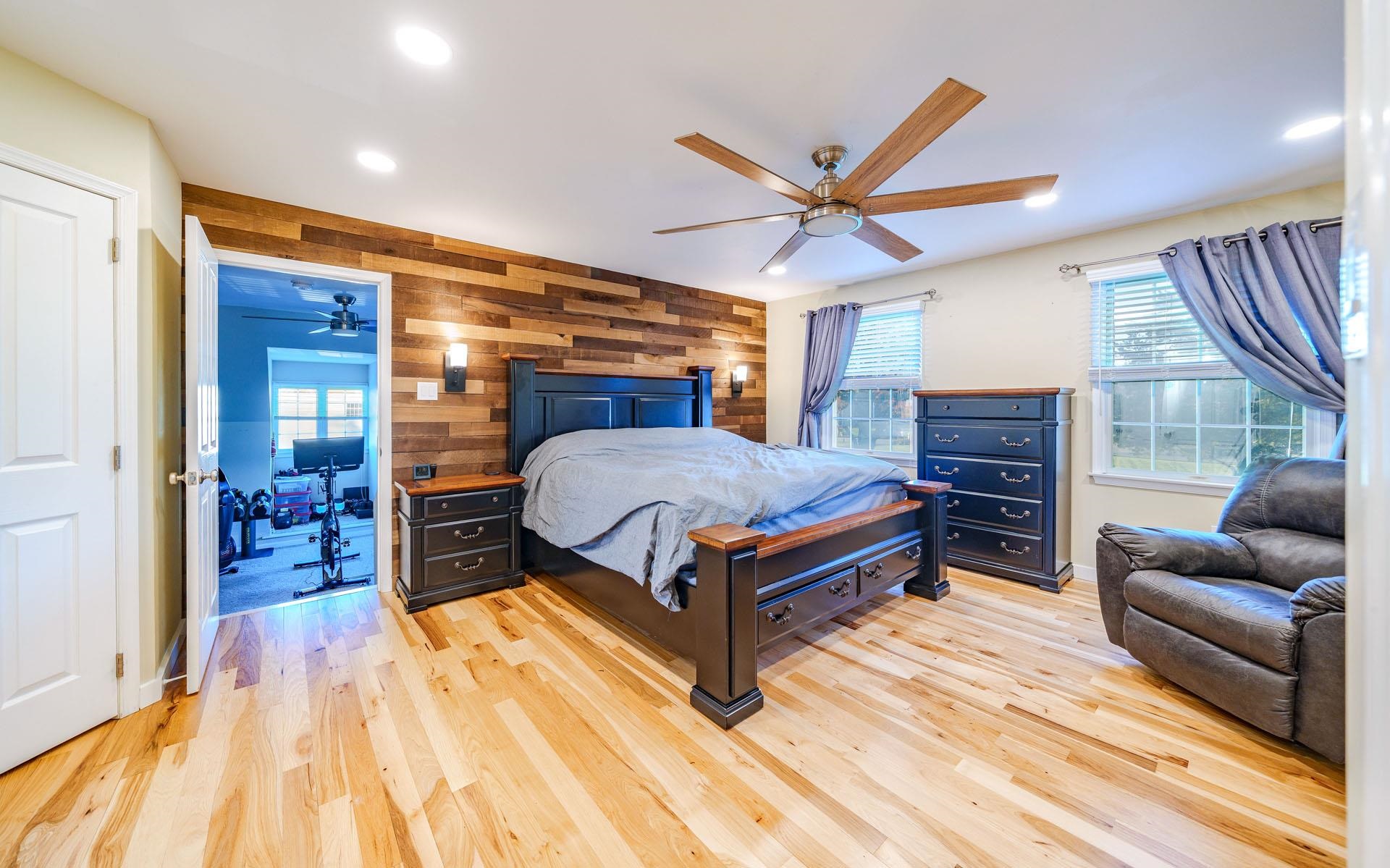 9 Deerfield Trail Woodbine, NJ 08270 - Photo 23 of 50 a bedroom with a bed and ceiling fan