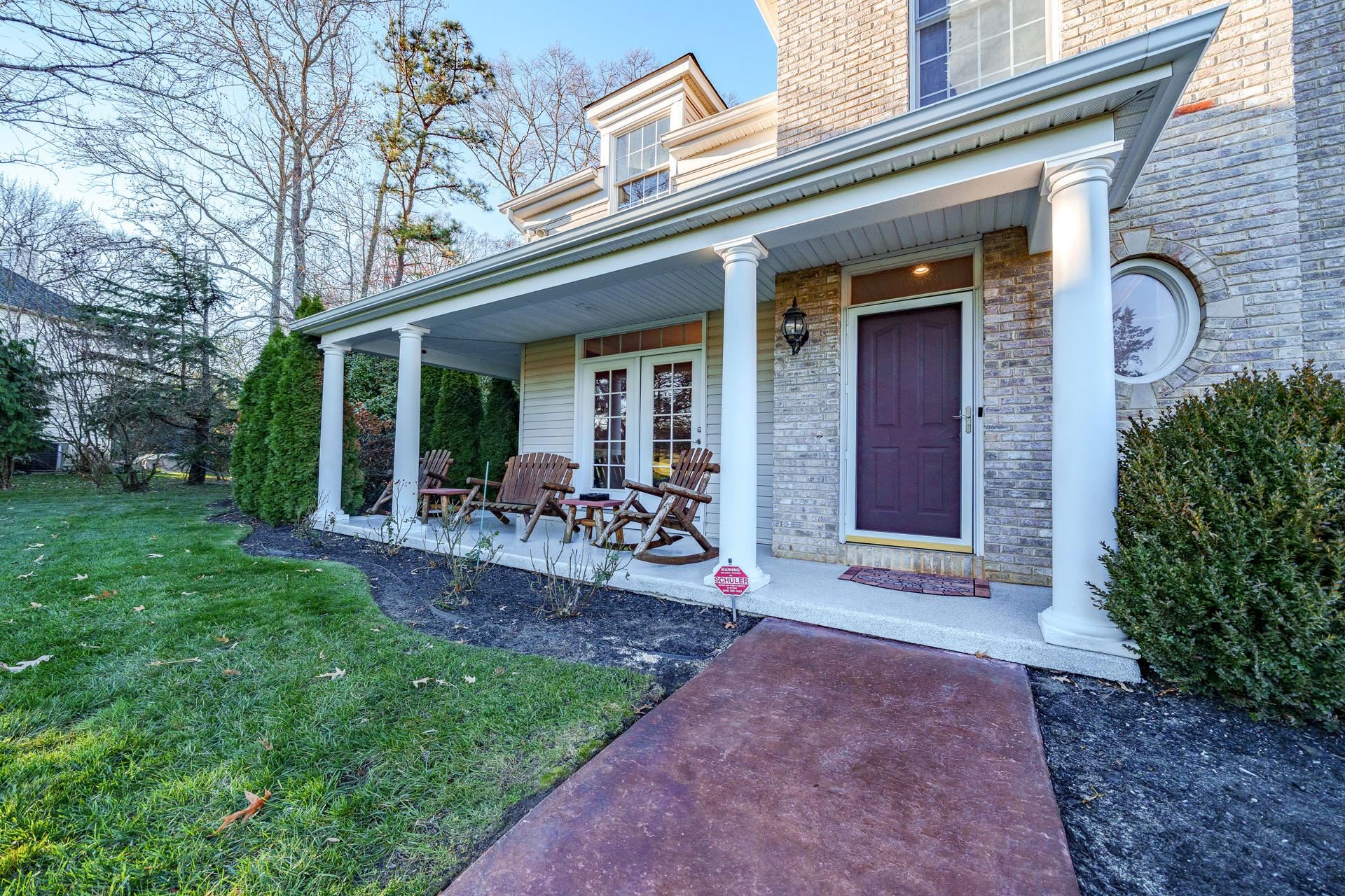 9 Deerfield Trail Woodbine, NJ 08270 - Photo 6 of 50 a front view of a house with garden