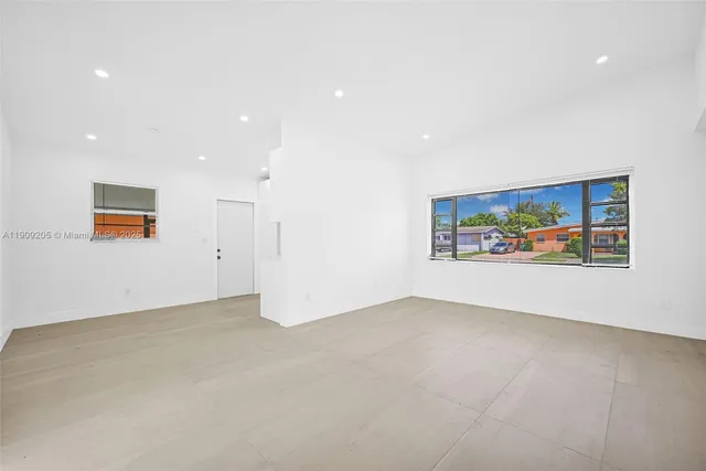 an empty room with window