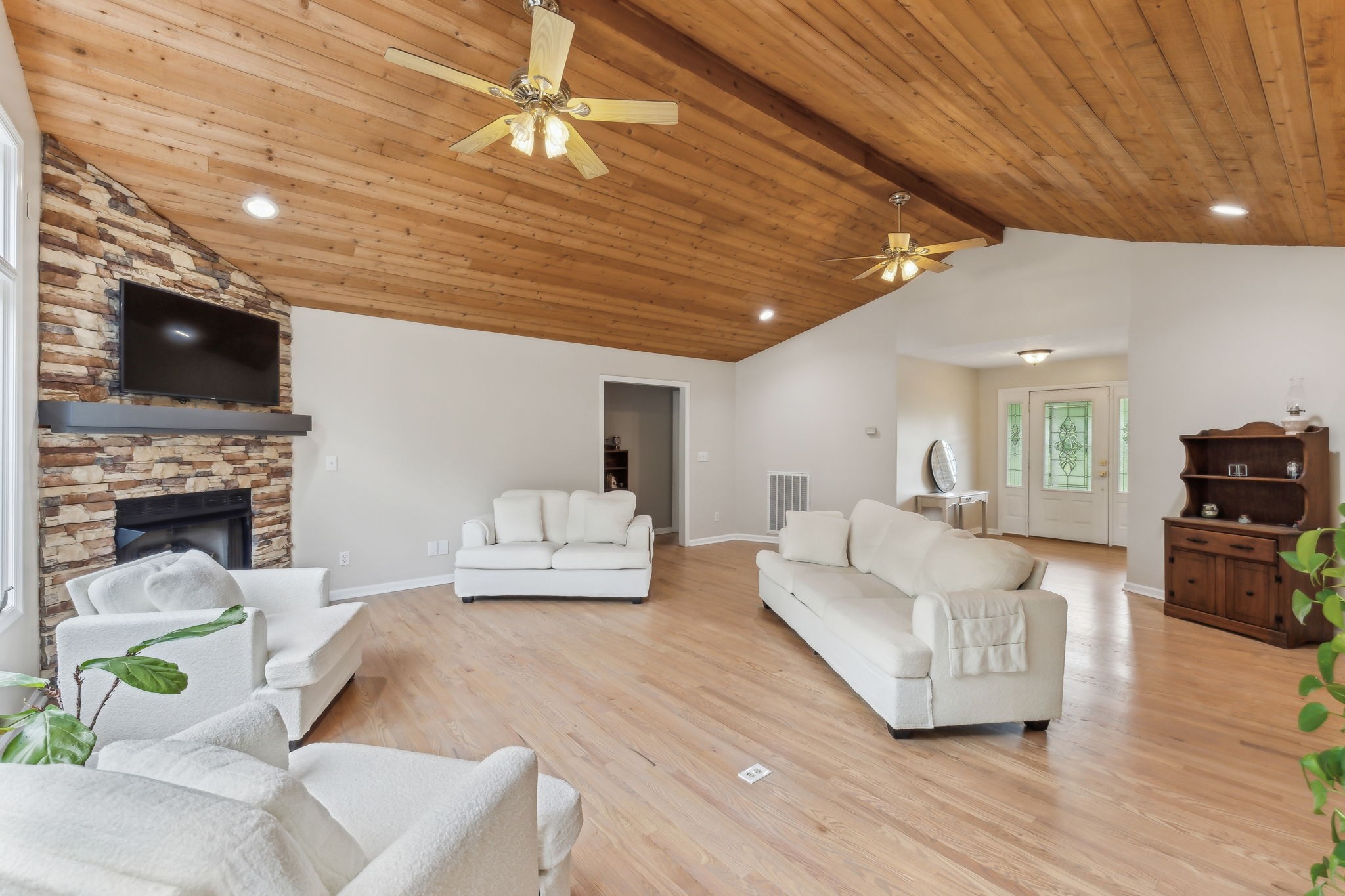 170 Cauble Ridge Lane Manchester, TN 37355 - Photo 17 of 71 a large living room with furniture a flat screen tv and a fireplace