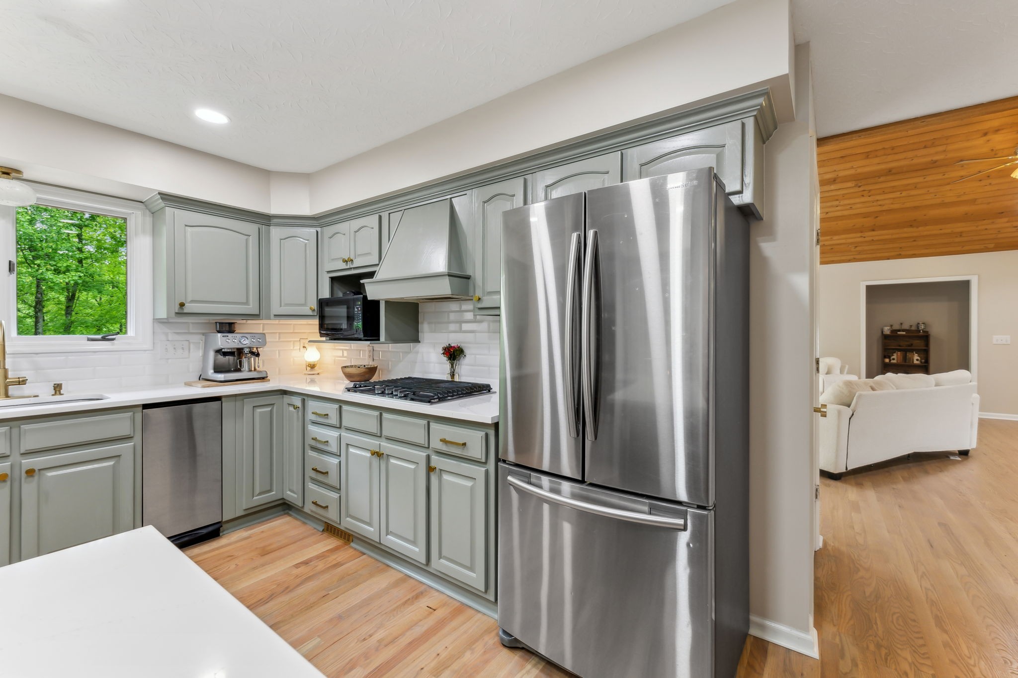 170 Cauble Ridge Lane Manchester, TN 37355 - Photo 24 of 71 a kitchen with a refrigerator a sink and cabinets