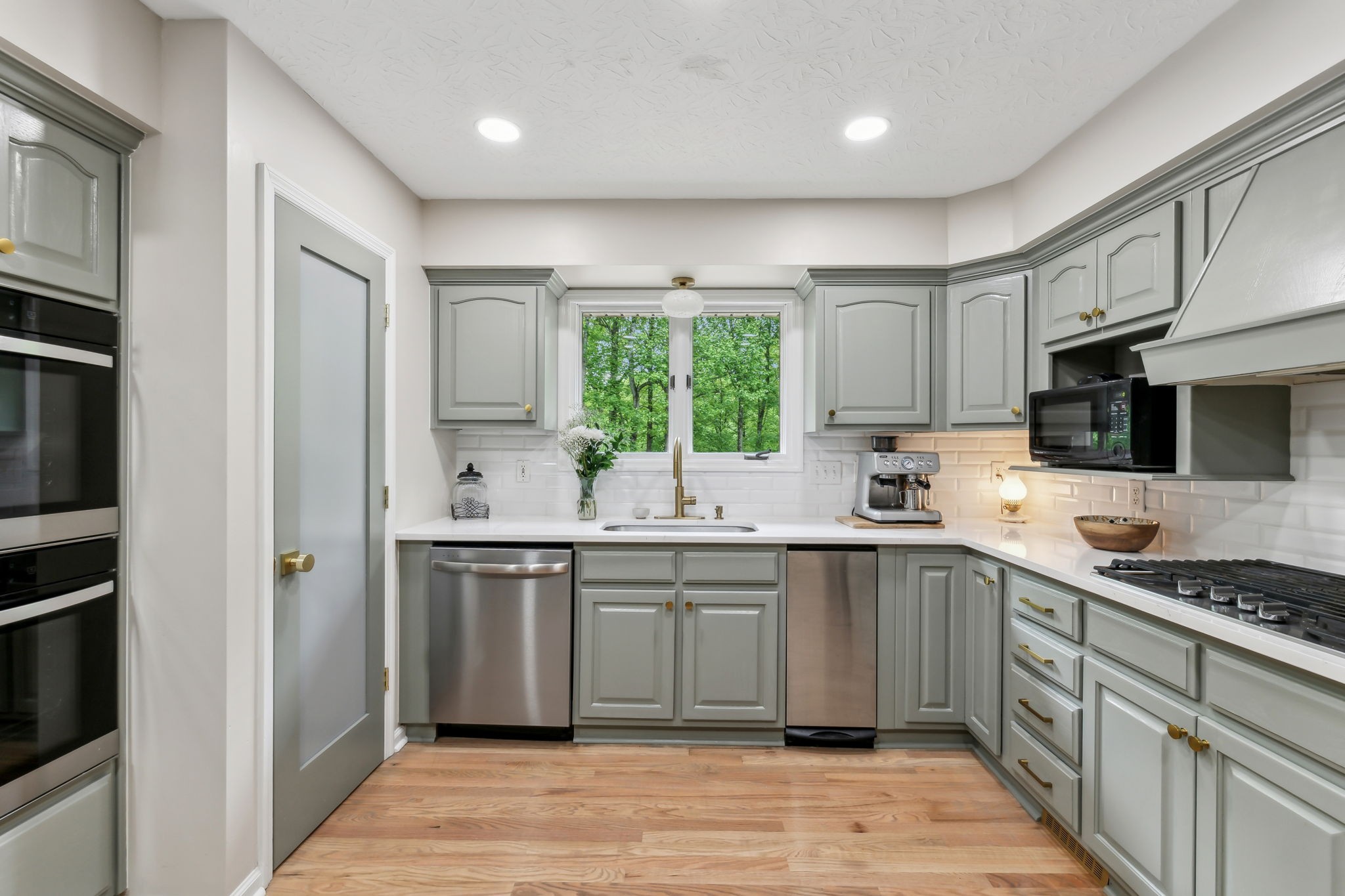 170 Cauble Ridge Lane Manchester, TN 37355 - Photo 29 of 71 a kitchen with stainless steel appliances granite countertop a stove and a sink