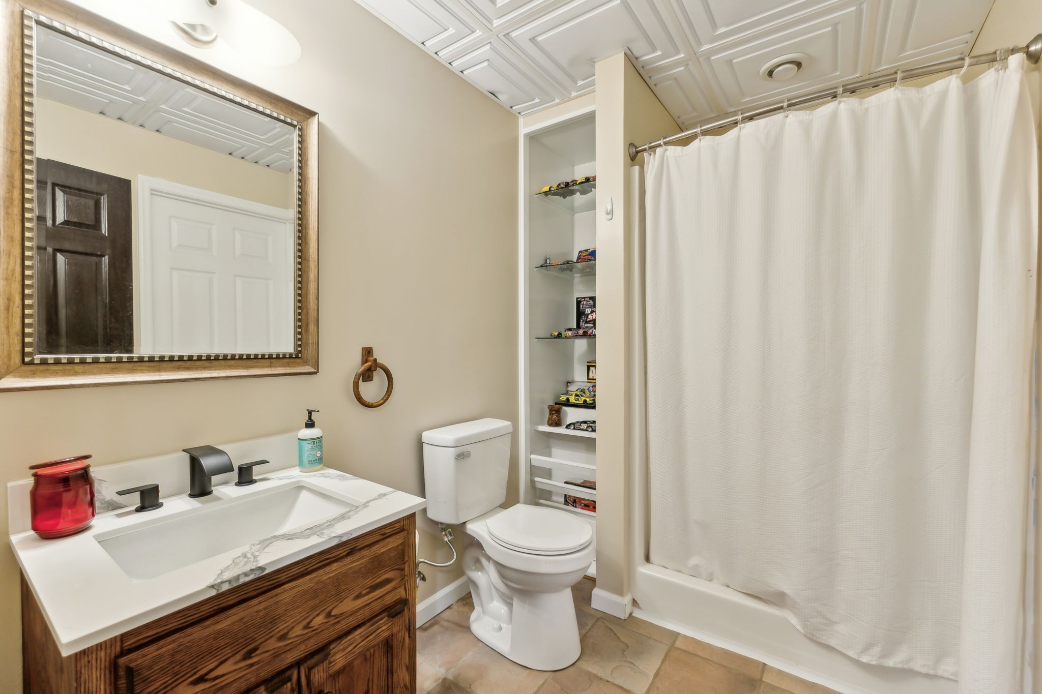 170 Cauble Ridge Lane Manchester, TN 37355 - Photo 45 of 71 a bathroom with a sink a toilet and shower curtain
