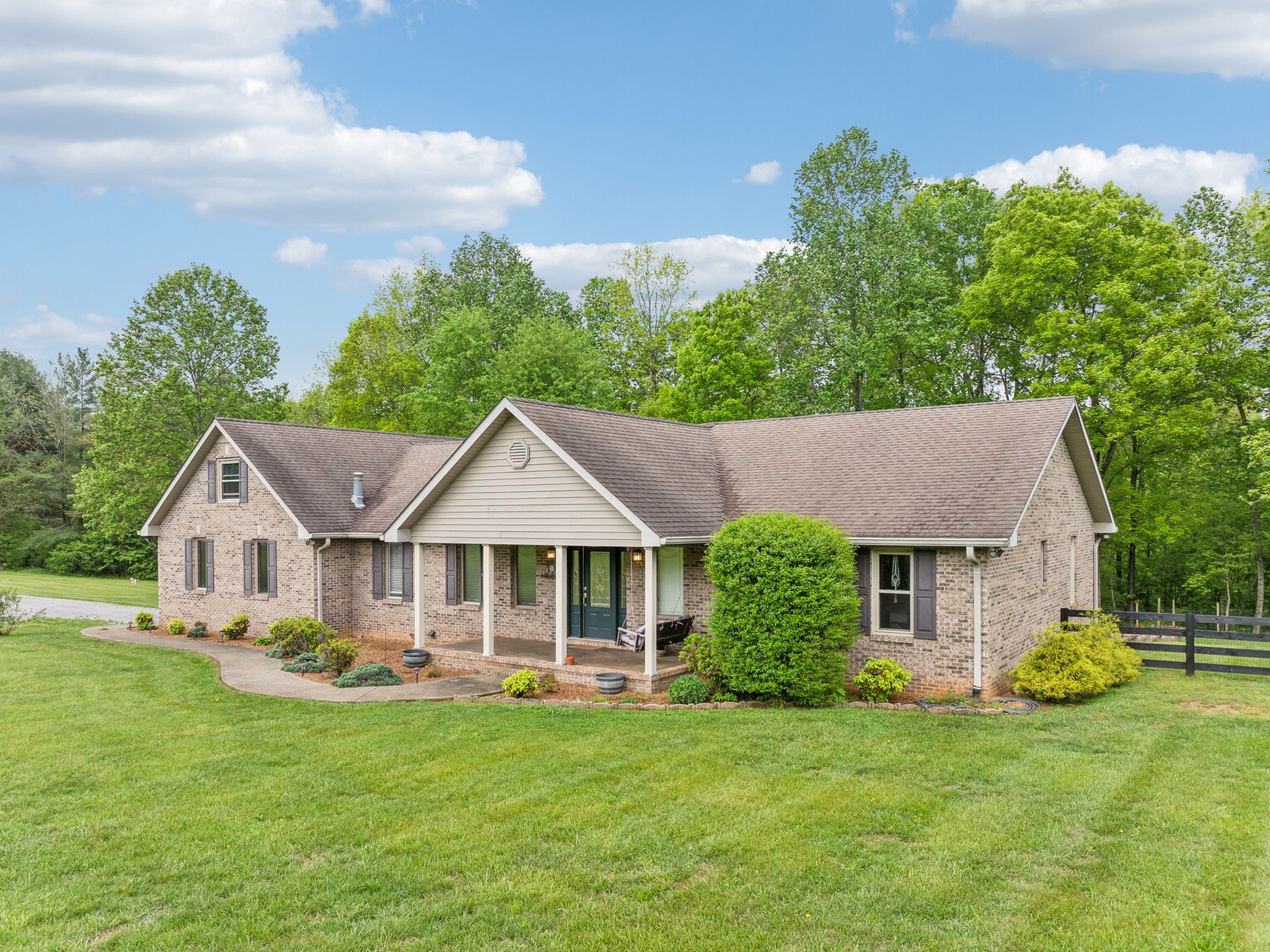 170 Cauble Ridge Lane Manchester, TN 37355 - Photo 60 of 71 a front view of a house with a garden and porch