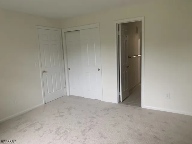 a bathroom with a tub a sink and a shower