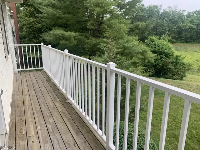 a view of a lake with a yard