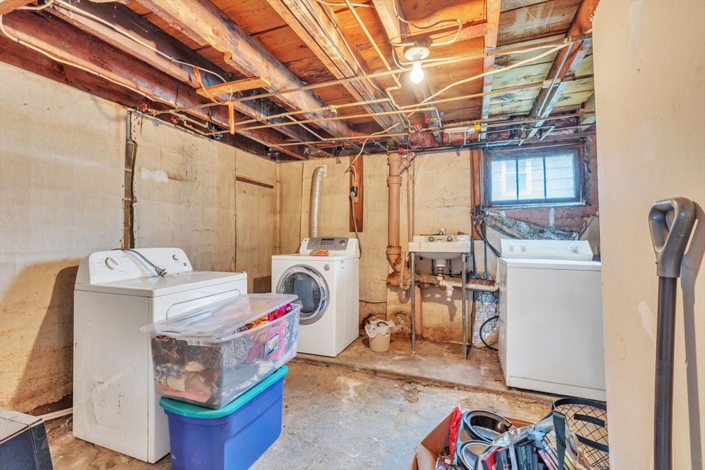 18 Goodwin Street Springfield, MA 01151 - Photo 25 of 31 a utility room with dryer and washer