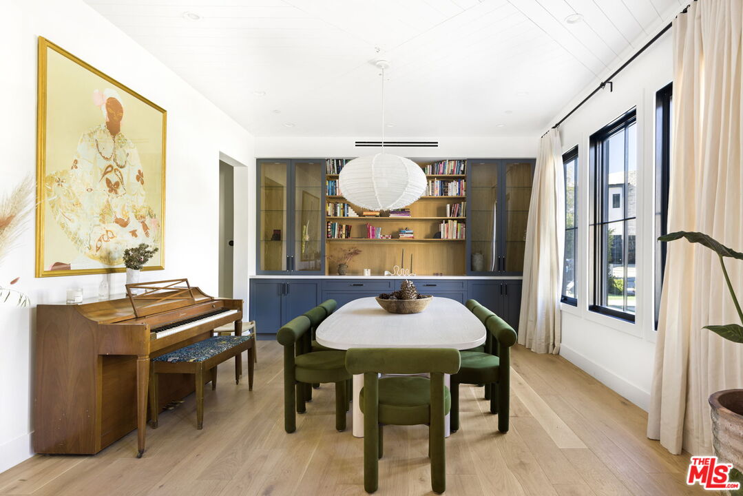 6310 Mirror Lake Drive Los Angeles, CA 90068 - Photo 4 of 34 a view of a dining room with furniture and window