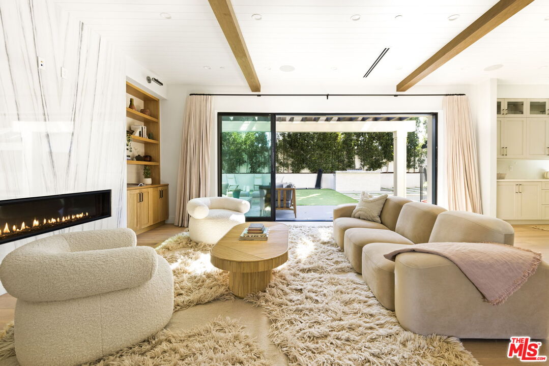 6310 Mirror Lake Drive Los Angeles, CA 90068 - Photo 5 of 34 a living room with furniture and a large window