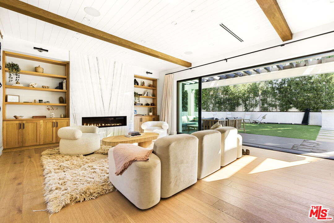 6310 Mirror Lake Drive Los Angeles, CA 90068 - Photo 6 of 34 a living room with furniture and a large window