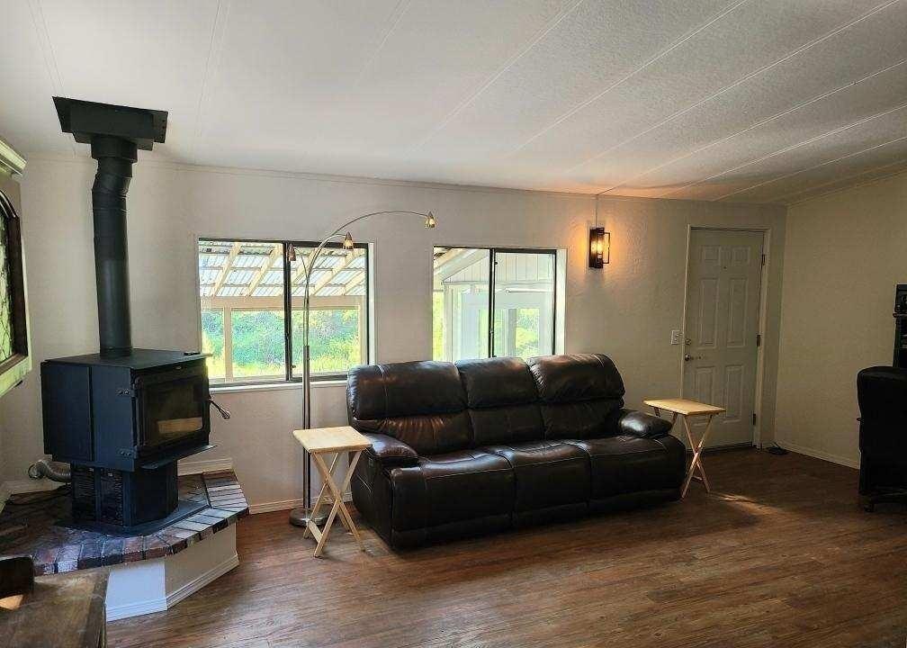 495 O Brien Road O'Brien, OR 97534 - Photo 5 of 14 Living room with wood stove (002)