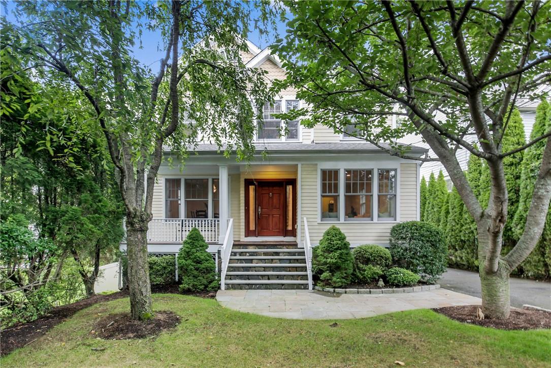 237 Grace Church Street Rye, NY 10580 - Photo 1 of 1 front view of a house with a yard