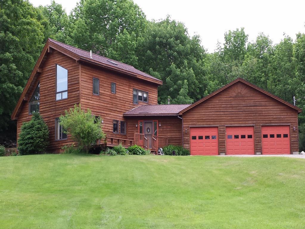 3328 Middle Road Sidney, ME 04330 - Photo 22 of 23 Front of home during the summer.
