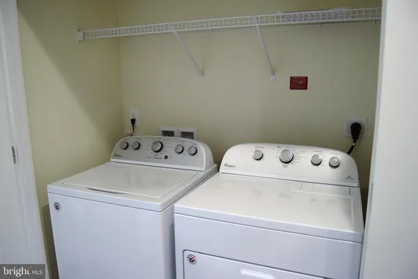 a front view of a house with yard