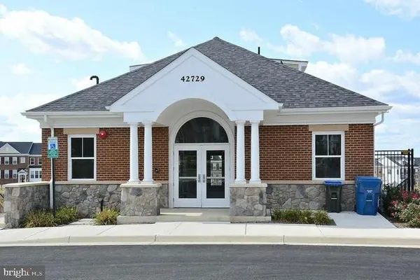 a view of a building with a garden