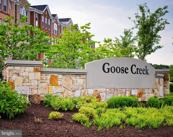 a view of a building with a yard