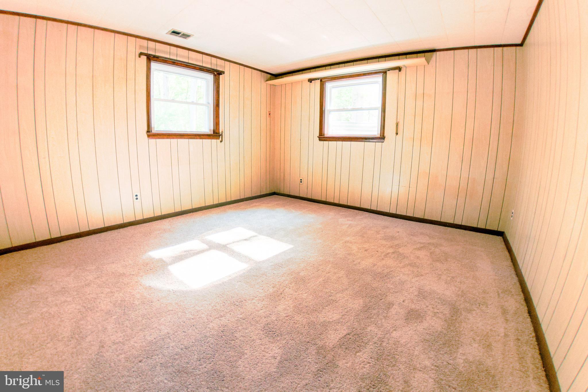 2720 Hidden Valley Road Accokeek, MD 20607 - Photo 28 of 43 an empty room with windows