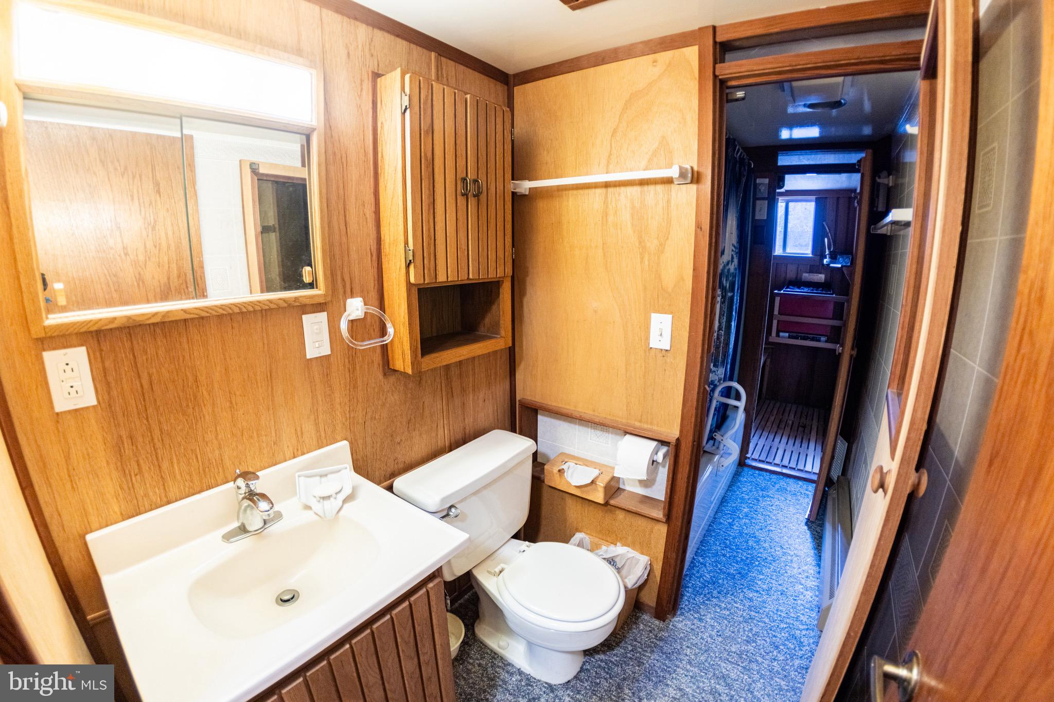 2720 Hidden Valley Road Accokeek, MD 20607 - Photo 30 of 43 a bathroom with a sink a toilet and shower
