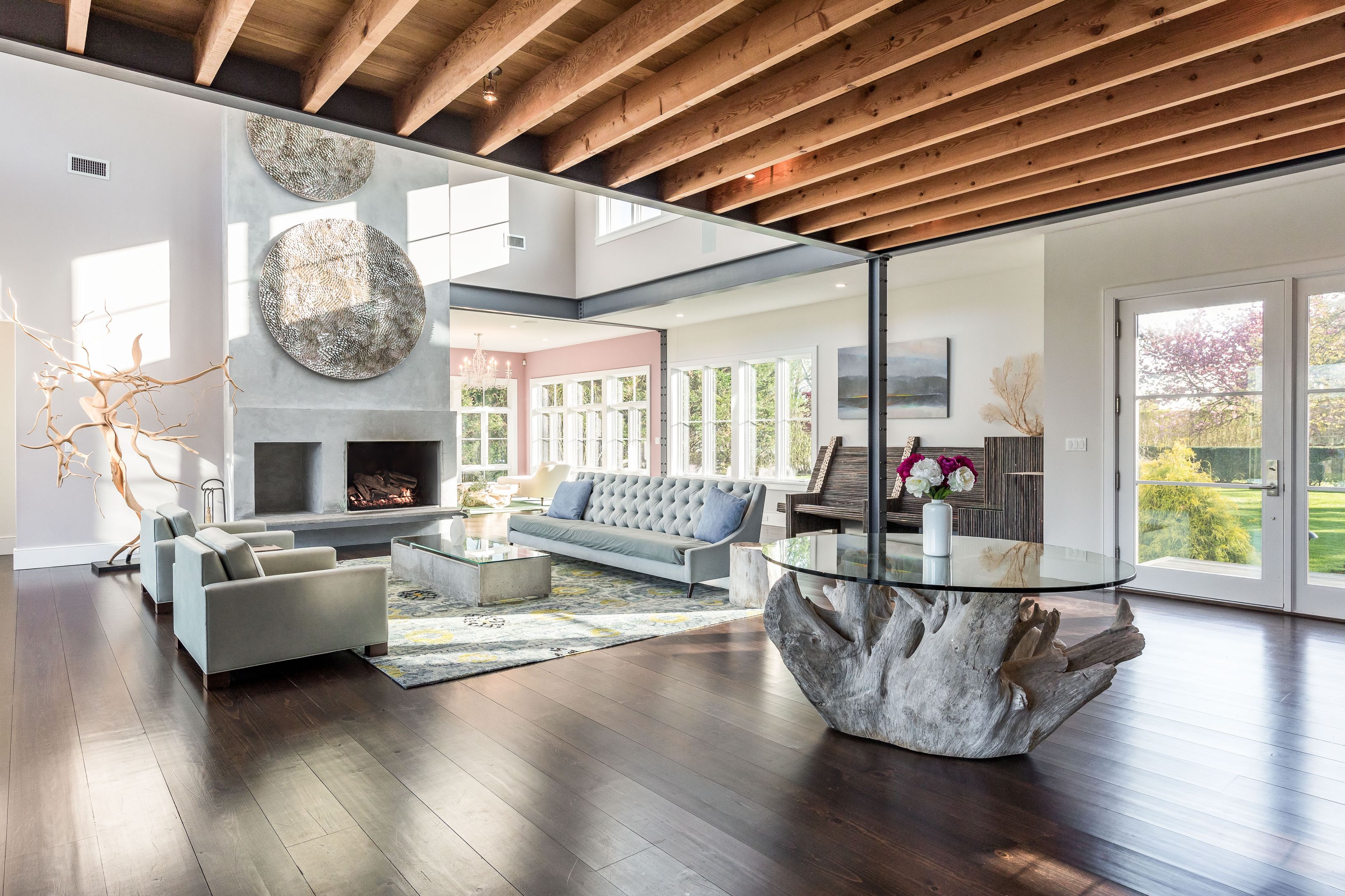 25 Jennifir Lane Bridgehampton, NY 11932 - Photo 14 of 44 a living room with fireplace furniture and a wooden floor