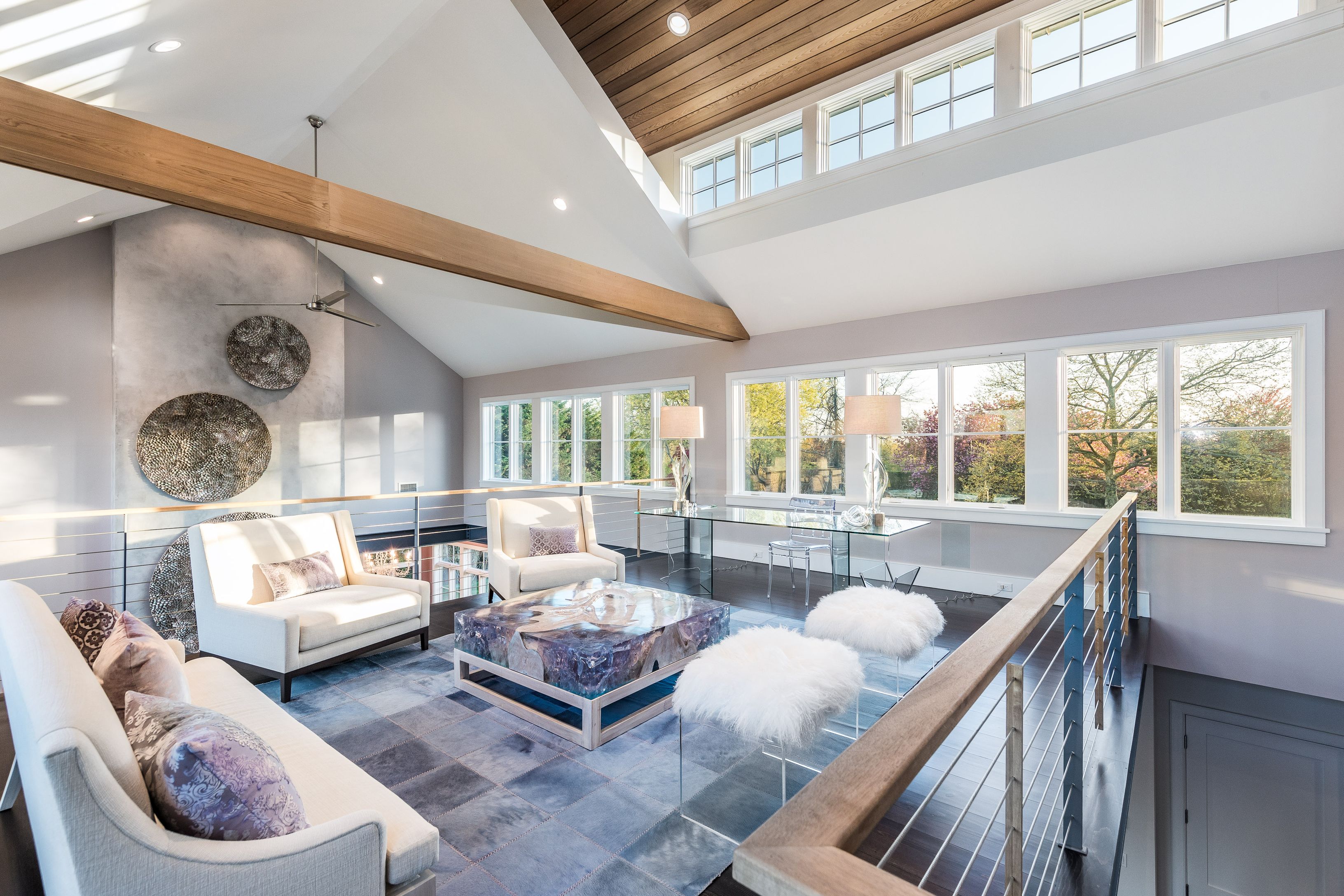 25 Jennifir Lane Bridgehampton, NY 11932 - Photo 25 of 44 a living room with furniture and a large window