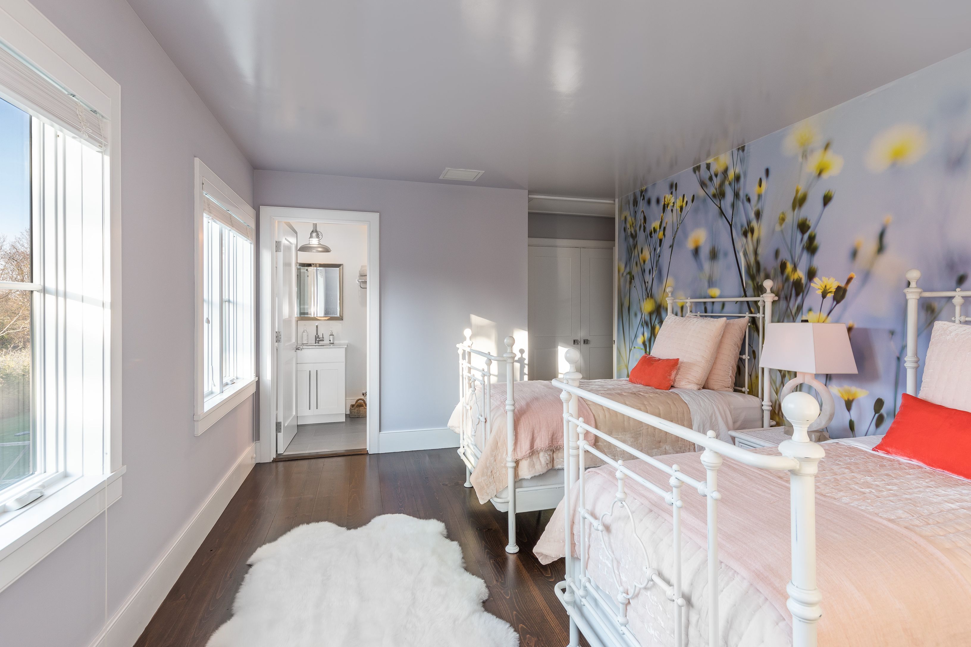 25 Jennifir Lane Bridgehampton, NY 11932 - Photo 31 of 44 a living room with furniture and a chandelier