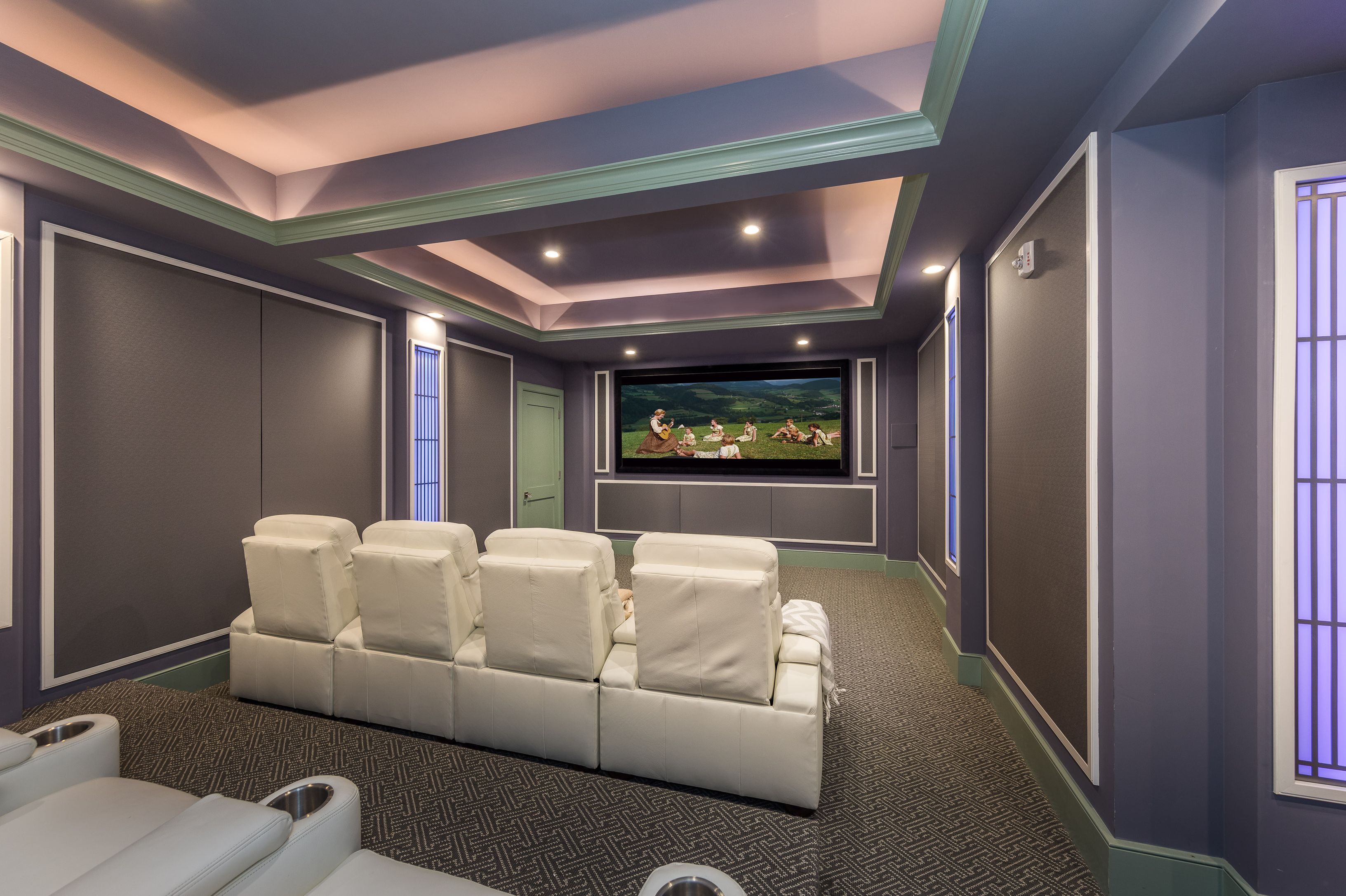 25 Jennifir Lane Bridgehampton, NY 11932 - Photo 34 of 44 a living room with furniture and a flat screen tv