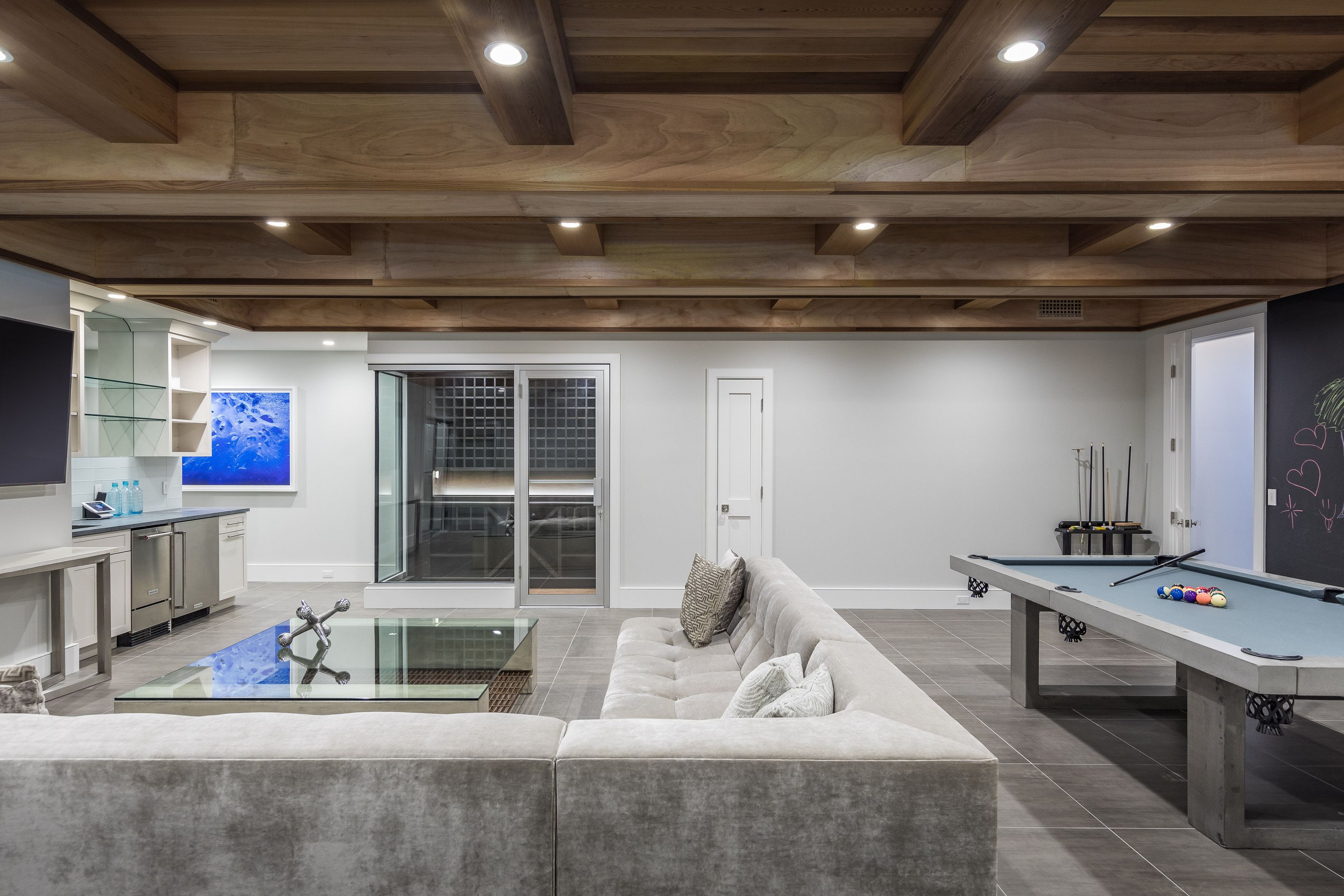 25 Jennifir Lane Bridgehampton, NY 11932 - Photo 35 of 44 a living room with furniture and a window