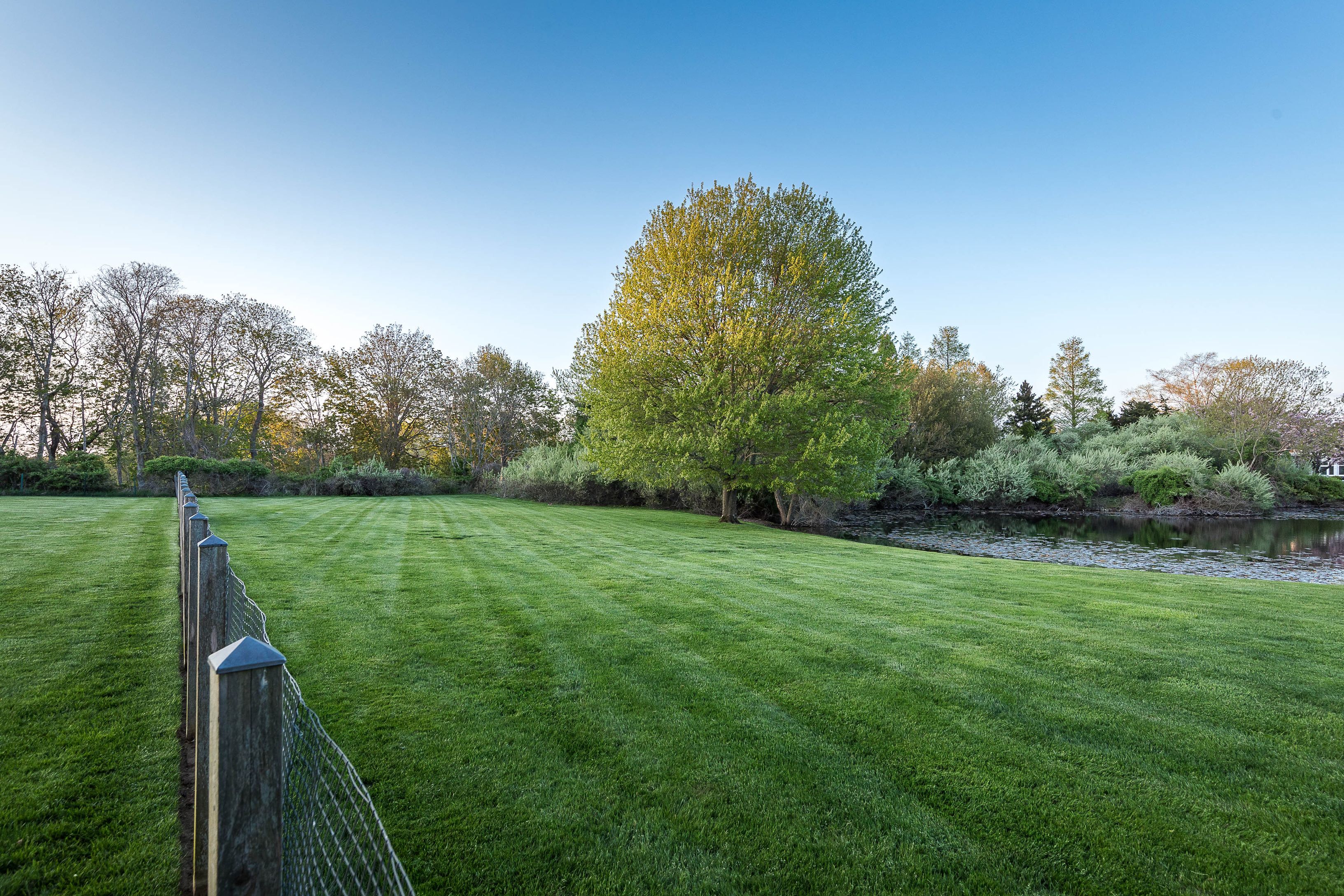 25 Jennifir Lane Bridgehampton, NY 11932 - Photo 43 of 44 a view of a golf course with a garden