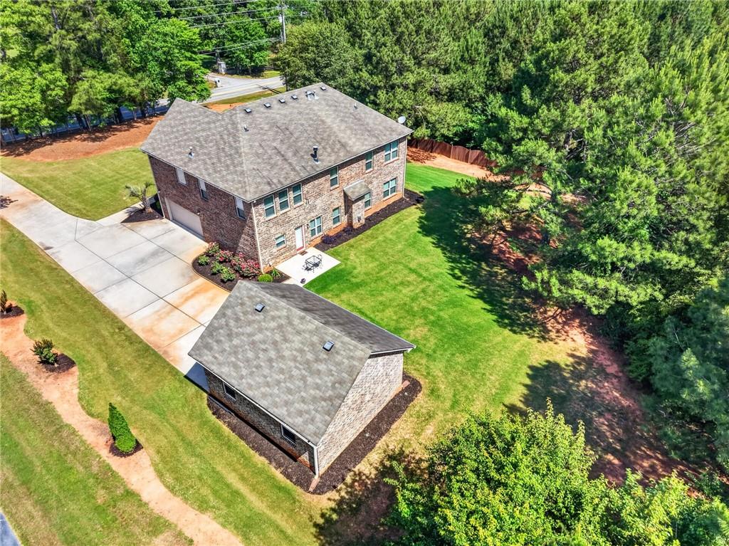 2300 Tucker Mill Road Southwest Conyers, GA 30094 - Photo 42 of 45 an aerial view of a house having yard