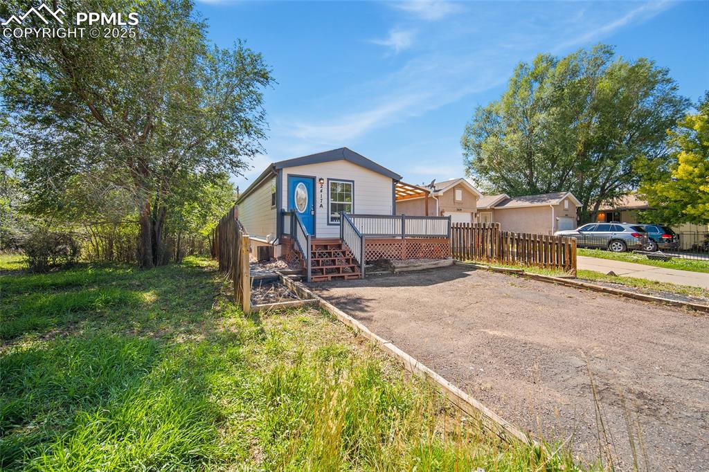 2417 West Cache La Poudre Street, Unit A & B Colorado Springs, CO 80904 - Photo 2 of 38 a view of a house with a patio