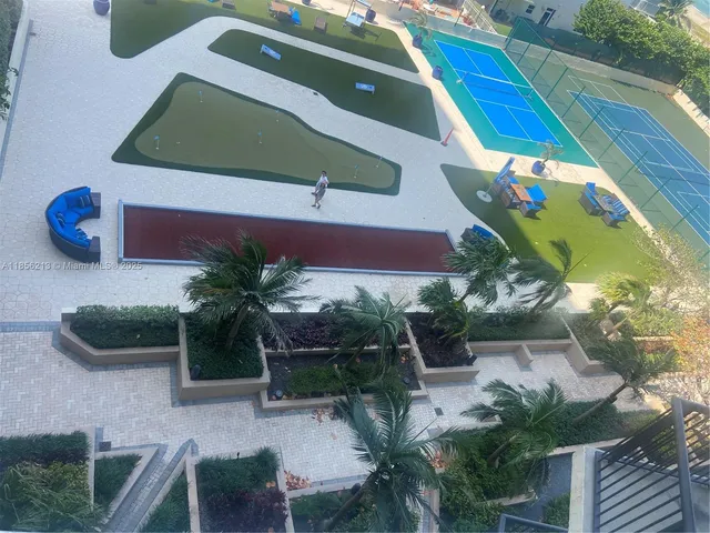 a view of a bench in front of house